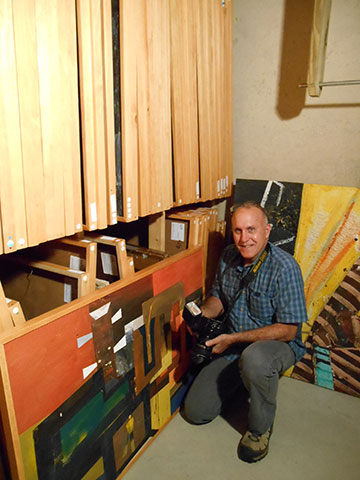 Dan photographing the paintings of Lewis Lanza Rudolph